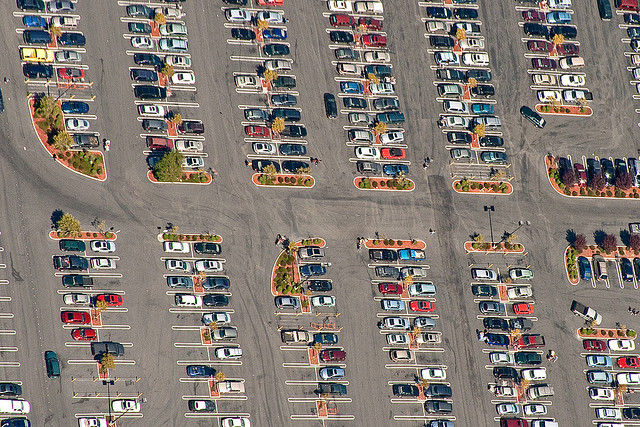 These maps show how parking lots eat U.S. cities - Big Think